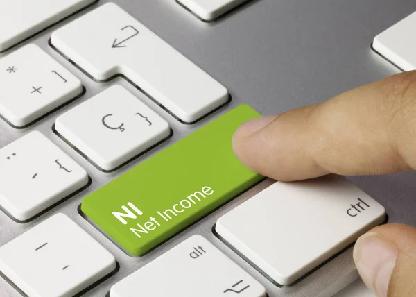 Ingresos netos de NI - Inscripción en clave de teclado verde . — Foto de Stock