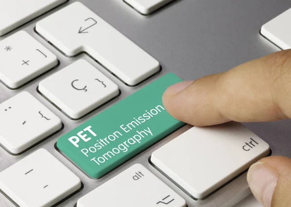 PET Positron Emission Tomography - Inscription on Green Keyboard — Stock Photo, Image