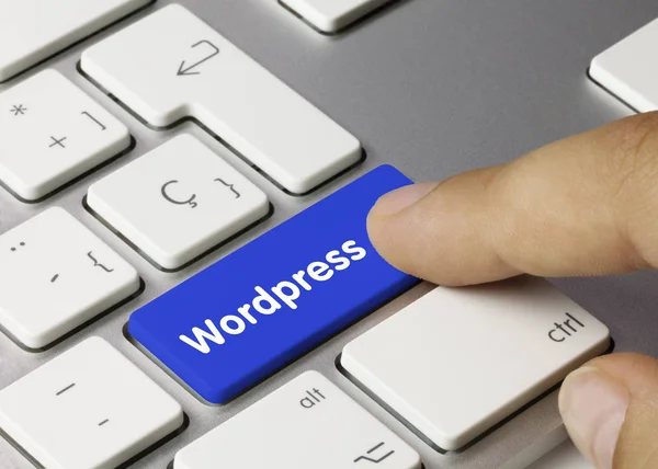 Wordpress - Inscrição na chave de teclado azul . — Fotografia de Stock