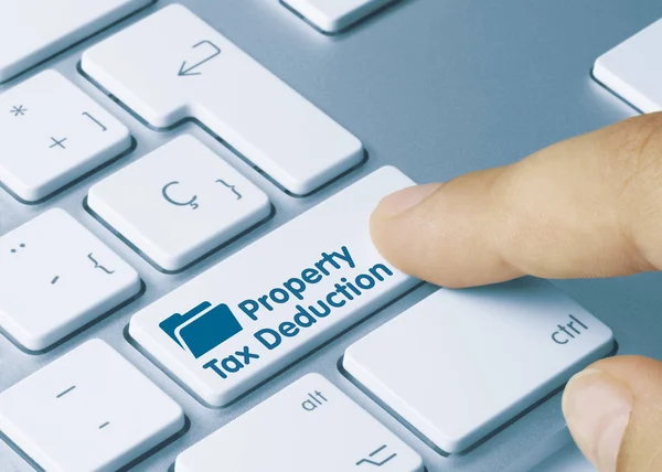 Property Tax Deduction Written Blue Key Metallic Keyboard Finger Pressing — Stock fotografie