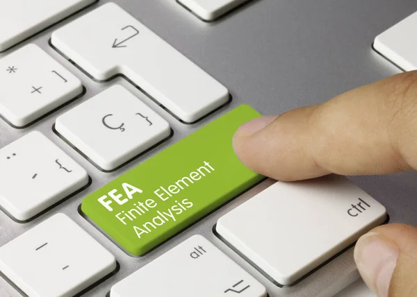 Fea有限元分析写在金属键盘的绿色键上 手指按键 — 图库照片