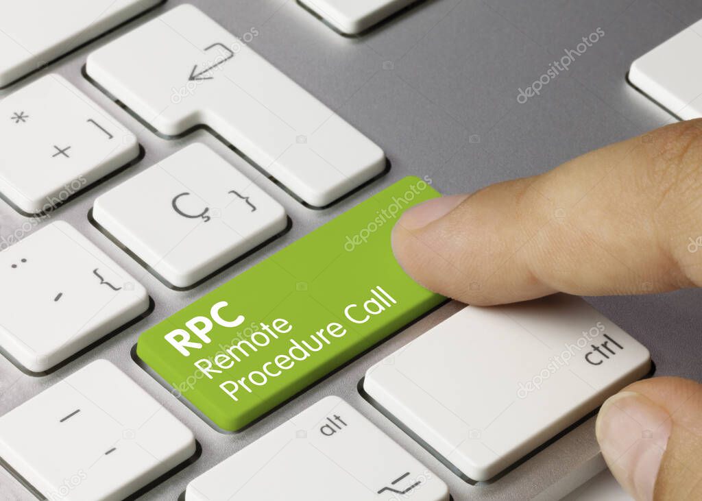 RPC Remote Procedure Call Written on Green Key of Metallic Keyboard. Finger pressing key.