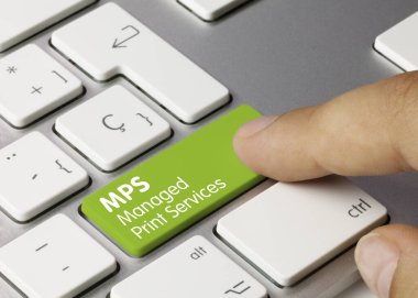 MPS Managed Print Services Written on Green Key of Metallic Keyboard. Finger pressing key clipart