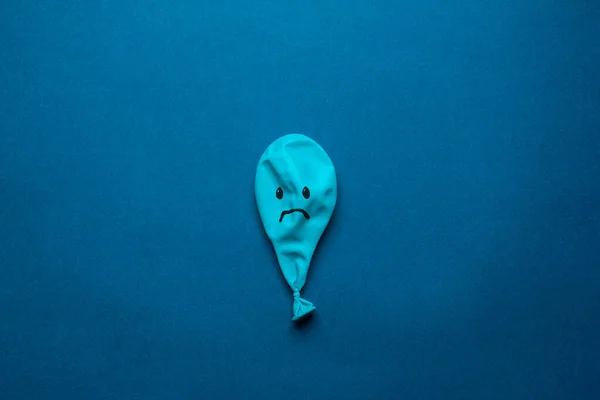 Stock photo of a blue monday balloon on a blue background — Stock Photo, Image