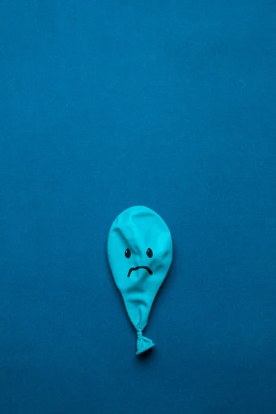 Stock photo of a blue monday balloon on a blue background — Stock Photo, Image