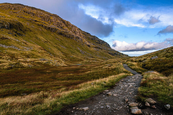 Picturesque path towards Ben Arthur near Tarbet in Scottish Highlands.