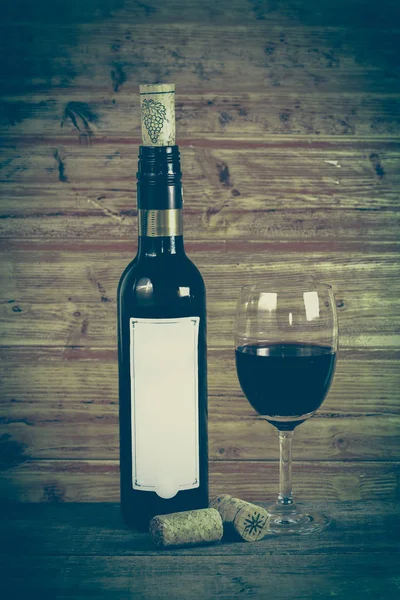 Bottle of wine with glass — Stock Photo, Image
