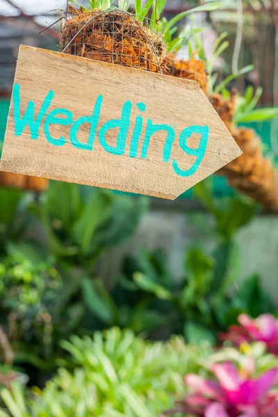 Wooden signboard with the inscription in  paint wedding. Wood ha