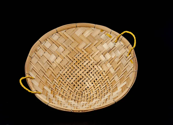 bamboo wood basketry on black background