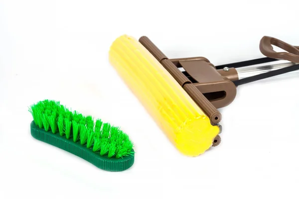 Green cleaning brush and Mob cleaning tool on white background — Stock Photo, Image