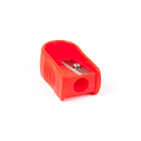 Temperamatite rosso strumento cancelleria su sfondo bianco isolato — Foto Stock