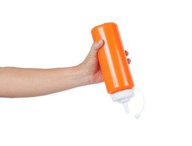 Beyaz arka plan üzerinde elinde soğuk kaynak şişe.