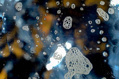 Soyut sabun köpüğü veya arkaplanda su damlası .