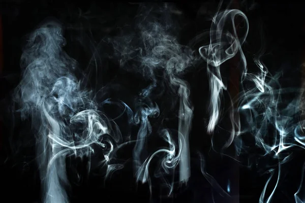 Abstract white smoke effect isolated on black background. — Stock fotografie