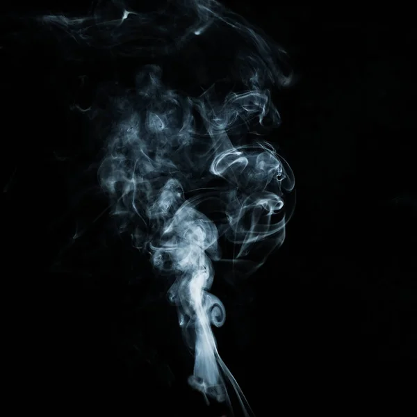 Abstract white smoke effect isolated on black background. — Stockfoto