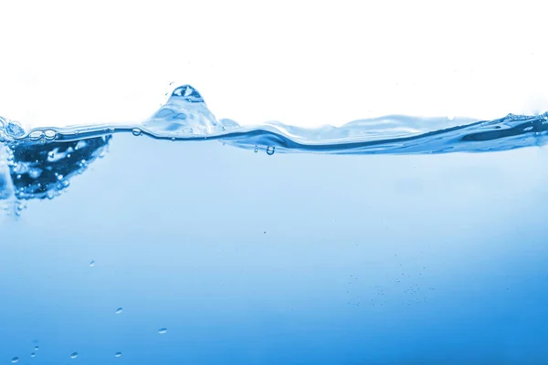 Eau éclaboussure ou vague d'eau avec des bulles d'air sur le fond — Photo