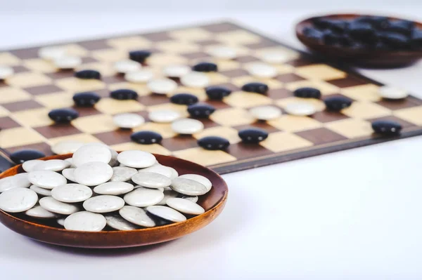 Board game Go and black and white bones. Go or wei-Chi ,asian bo
