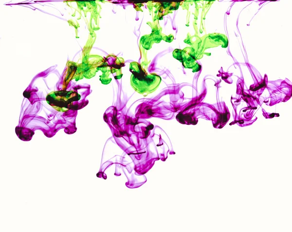 De kleurrijke inkt in het water. Uittreksel. achtergrond. Behang. — Stockfoto