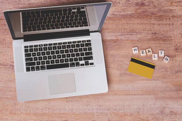 Top view of laptop with credit card on top table, Business for health
.
