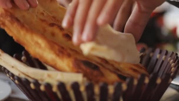 Pita bread from hot stove. Lavash is traditional bread in Near East countries. — Stock Video