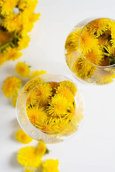 dandelions, dandelion wine, dandelions in a glass