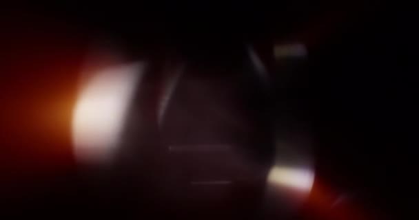 Fuites de lumière ambrée sur fond noir. Superposition. Transition. Filtres de couleur vidéo