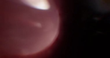 Siyah Arkaplanda Sıcak Işık Sızıntıları. Üst üste koy. Dönüşüm. Video Renk Filtresi