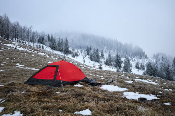 Tent in the winter mountains