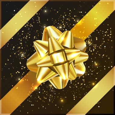 Altın sarı Noel yay hediye kutusu üzerine konfeti ile