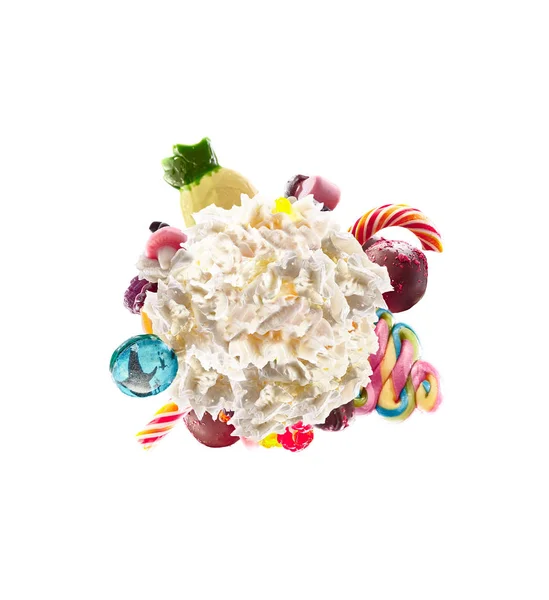Whipped round cream with colored sweets, jelly and candies isolated. Sweet life concept. Sweet dessert - whipped milk cream concept with treat, kid cartoon colorful cream, white whipped cream with — Stock Photo, Image