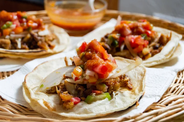 Mexican carnitas tacos, traditional food of Michoac��n — стокове фото