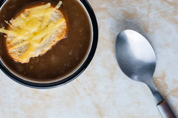 French onion soup with cheese topped croutes