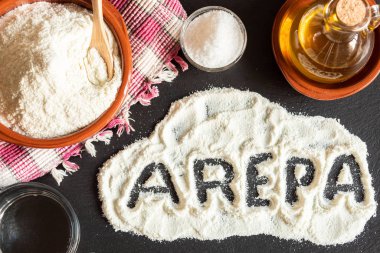 Ingredients for making corn arepas clipart