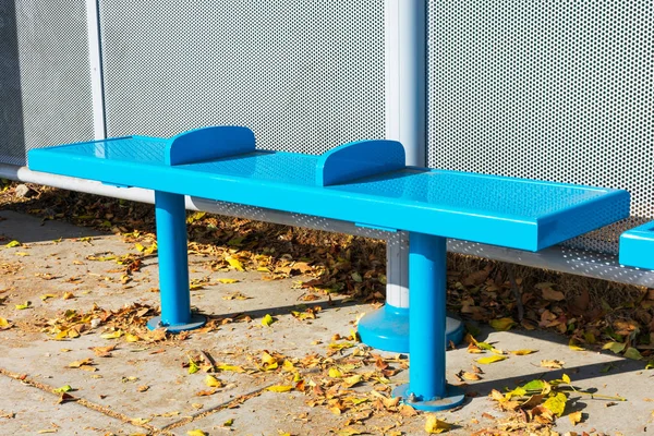 Armrest in the middle of bench