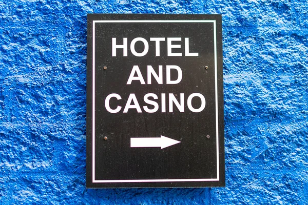 Hotel Casino sign on the wall directing customers to the entrance — Stock Photo, Image