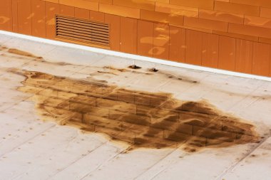 Ponding dirty water on settled flat roof is a sign of a drainage problem. Excessive ponding can attract insects, mold, vegetation and cause structural damage to the building clipart