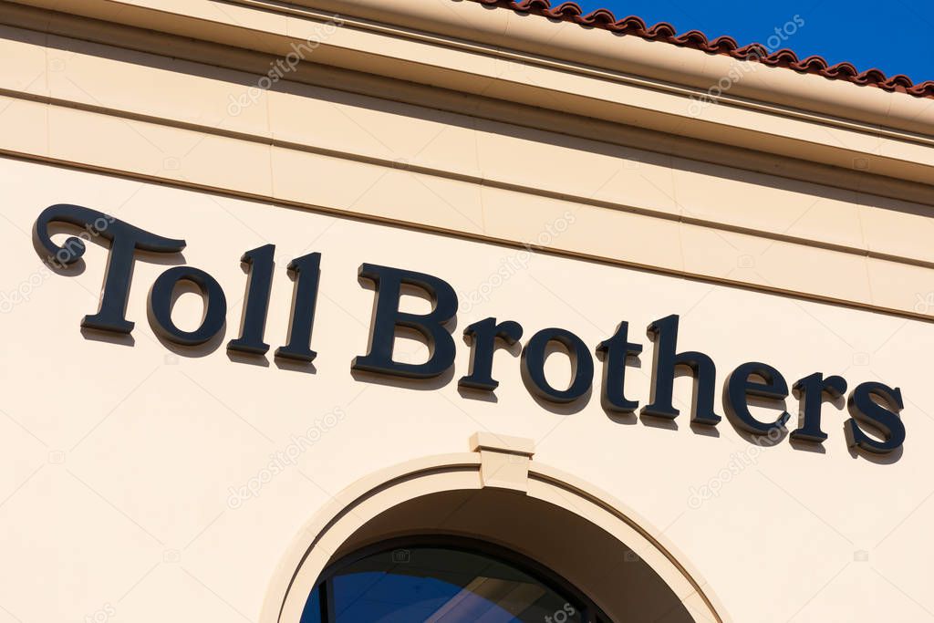 Toll Brothers sign atop Silicon Valley office of a home construction company that specializes in building new luxury homes - San Jose, California, USA - 2020