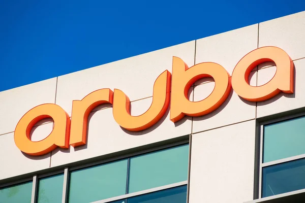 Aruba company sign atop headquarters building. Aruba Networks is a wireless networking subsidiary of HPE — Stock Photo, Image