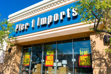 Pier 1 Imports store facade with sale discounts due to the closing of the store. The chain declares bankruptcy and files for Chapter 11 protection