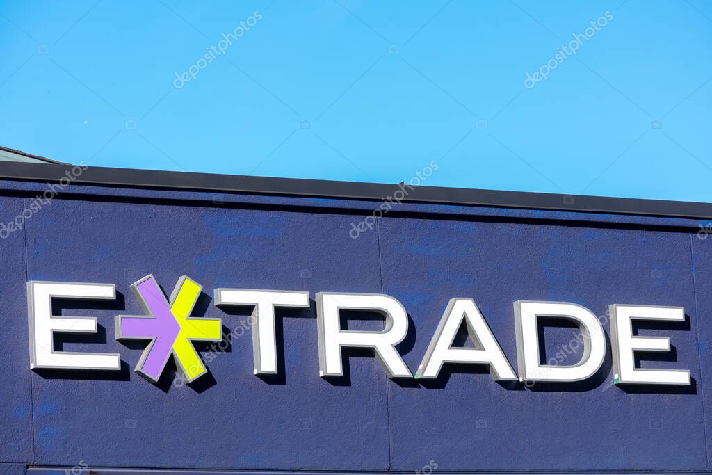 E-Trade Financial Corporation logo, stylized as ETRADE, on discount brokerage branch. Wall Street investment bank Morgan Stanley acquired E-Trade - San Jose, California, USA - 2020