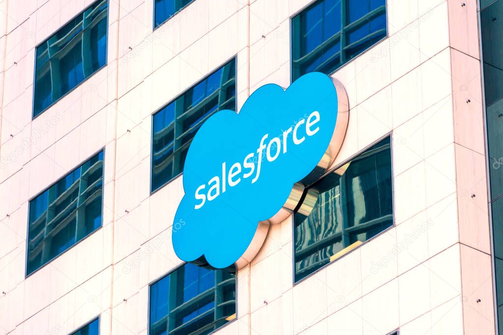 Salesforce cloud logo on modern facade of software company headquarters office building - San Francisco, California, USA - 2020