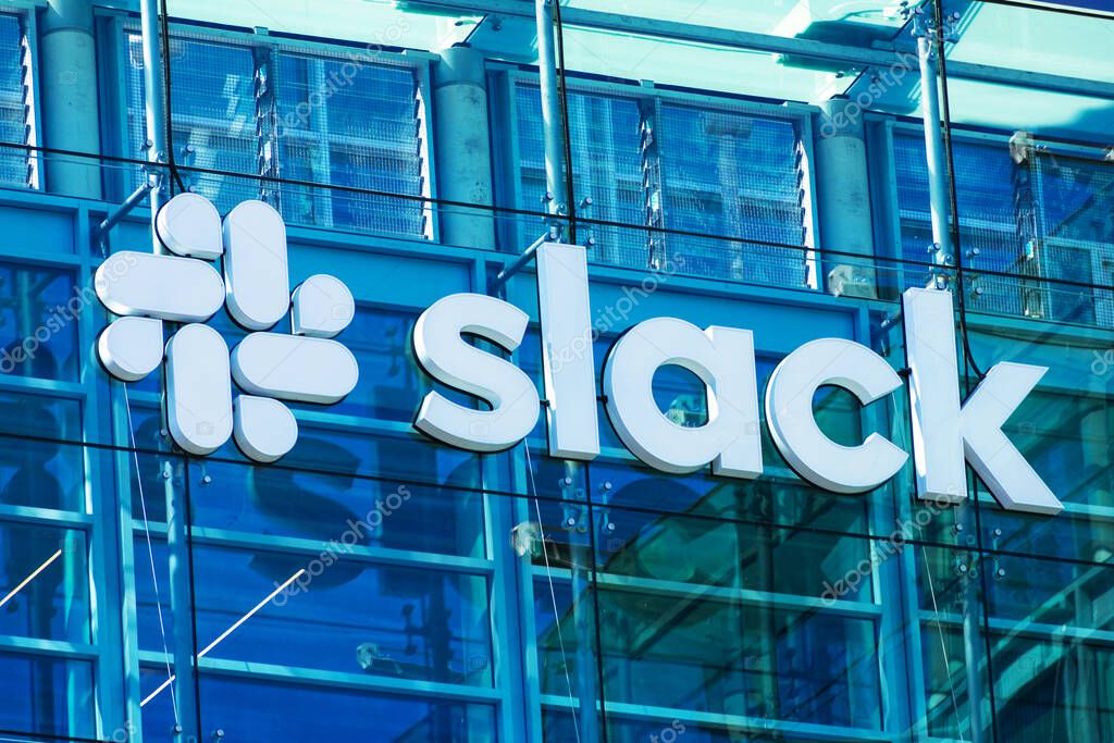 Slack logo. Slack Technologies, Inc designs and develops communication platform for real-time messaging, file sharing, archiving, and searching services - San Francisco, California, USA - 2020