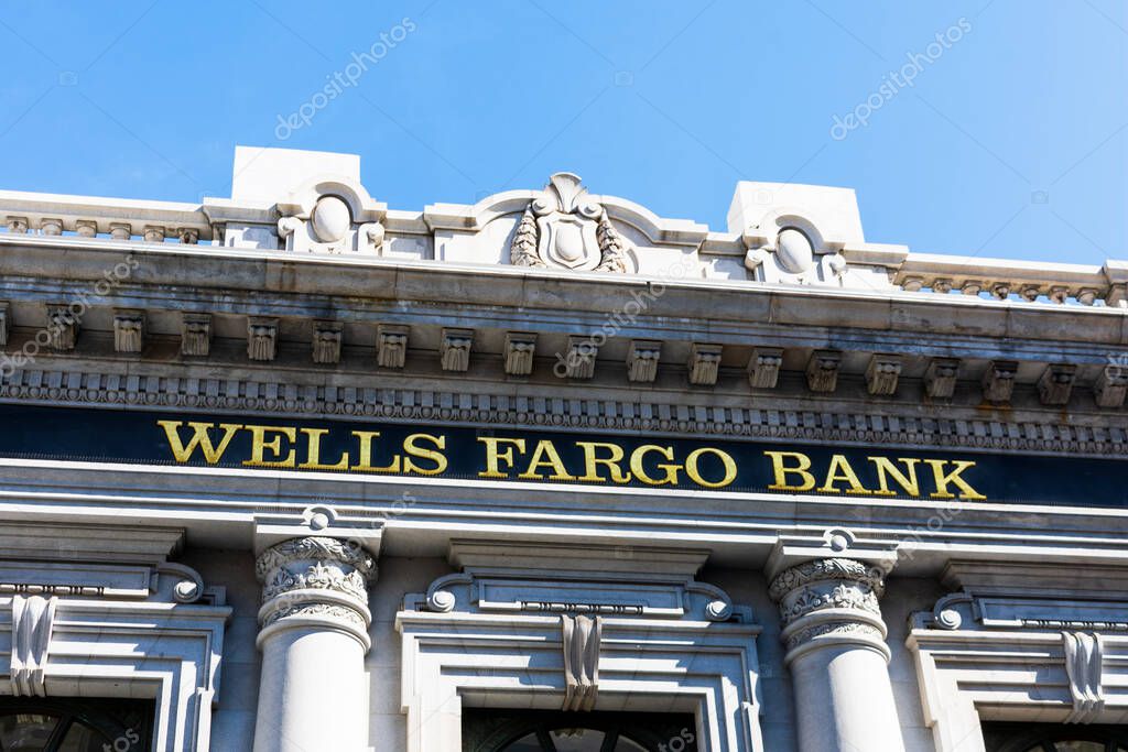 Wells Fargo Bank sign on historic headquarters complex. Wells Fargo and Company is an American multinational financial services company - San Francisco, California, USA - 2020