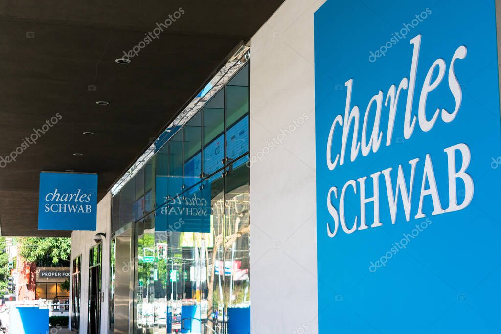 Charles Schwab sign on headquarters.Charles Schwab Corporation is an American bank and stock brokerage firm - San Francisco, California, USA - 2020