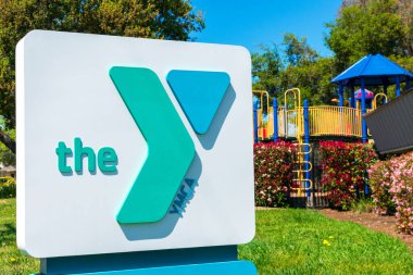 YMCA sign at nonprofit organization club location offering child care service - San Jose, California, USA - 2020 clipart