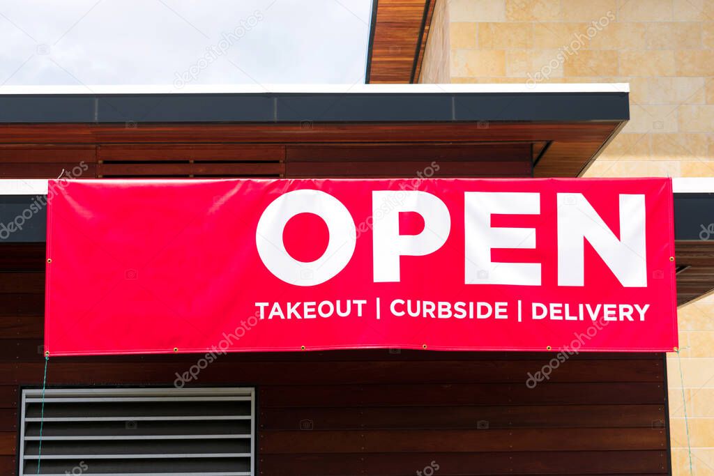 Open for takeout, curbside and delivery outdoor advertisement banner.