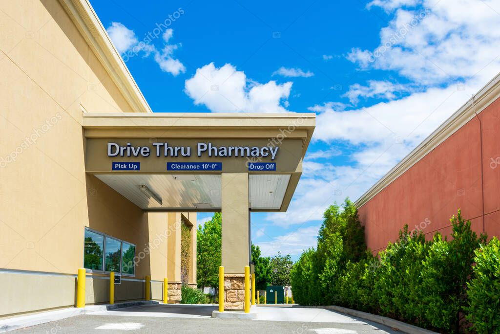 Typical covered drive thru pharmacy, is convenient of pharmacy feature, allowing customer to grab your everyday essentials and prescriptions without getting out of the car - San Jose, CA, USA - 2020