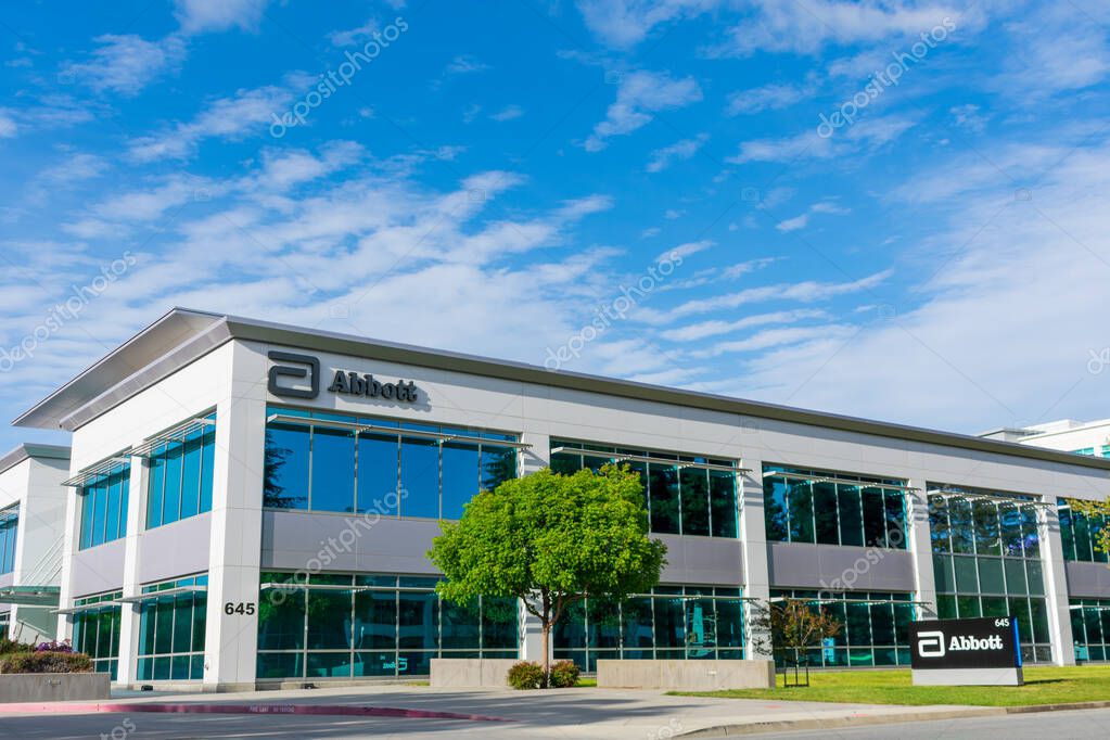 Abbott Laboratories modern office exterior under blue sky. Abbott Laboratories develops a broad line of health care products and services - Sunnyvale, California, USA - 2020