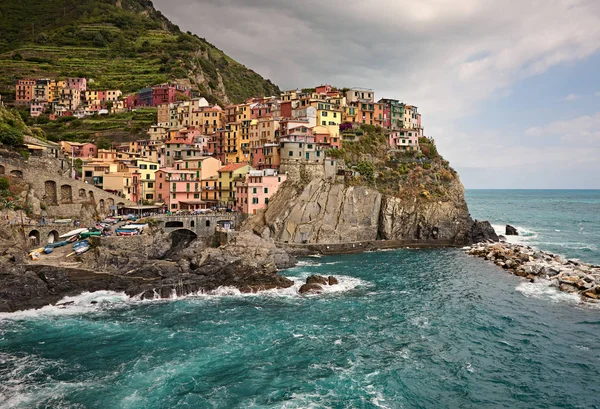 scenic view of the sea and houses on the cliff