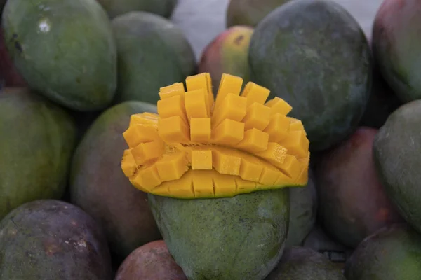 Mango fruit cut into wedges — Stock Photo, Image